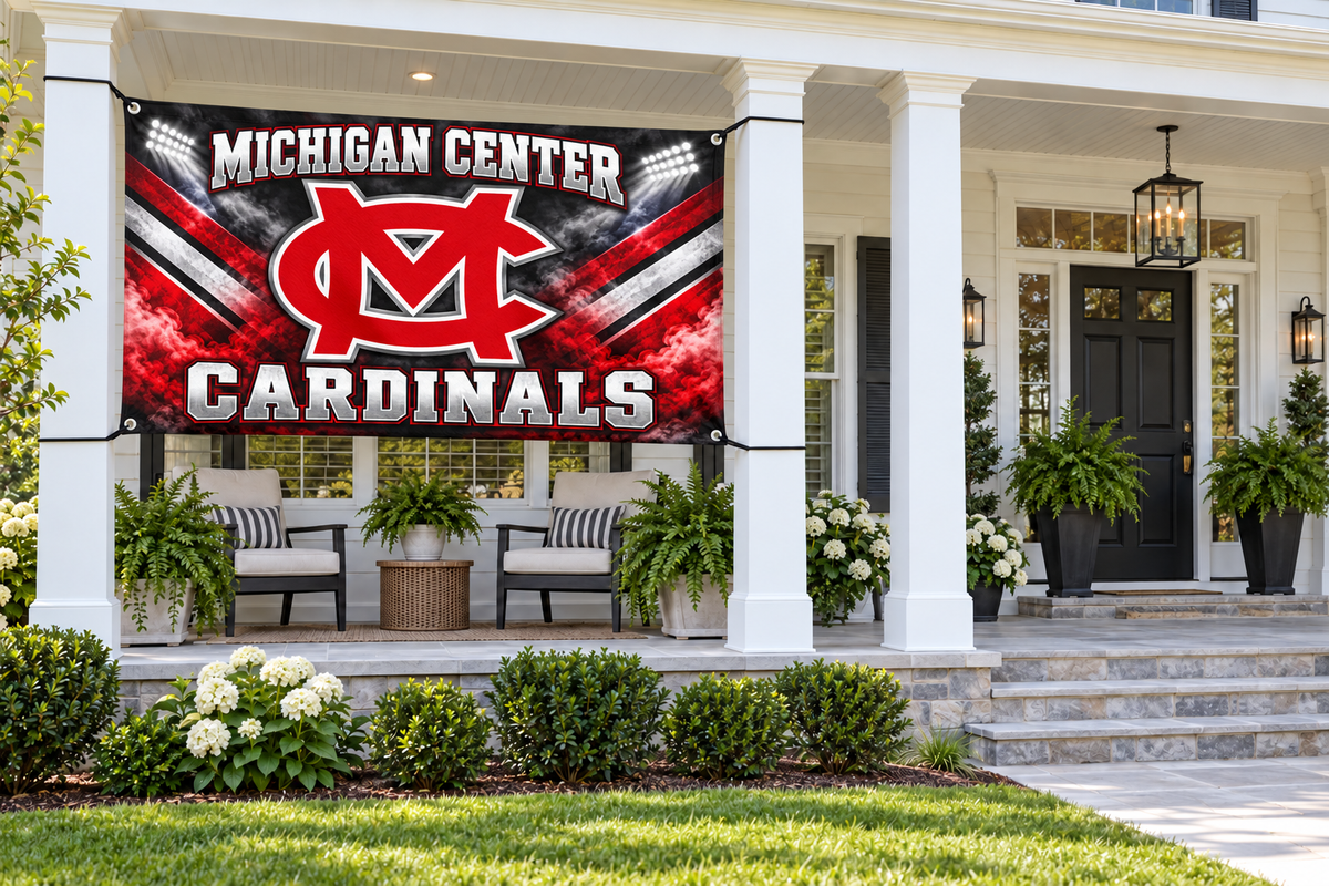 Michigan Center Cardinals MC Pride Flags & Banners – 4 by 8 foot banner tied through four corner grommets in a side porch bay; front door and walkway clear