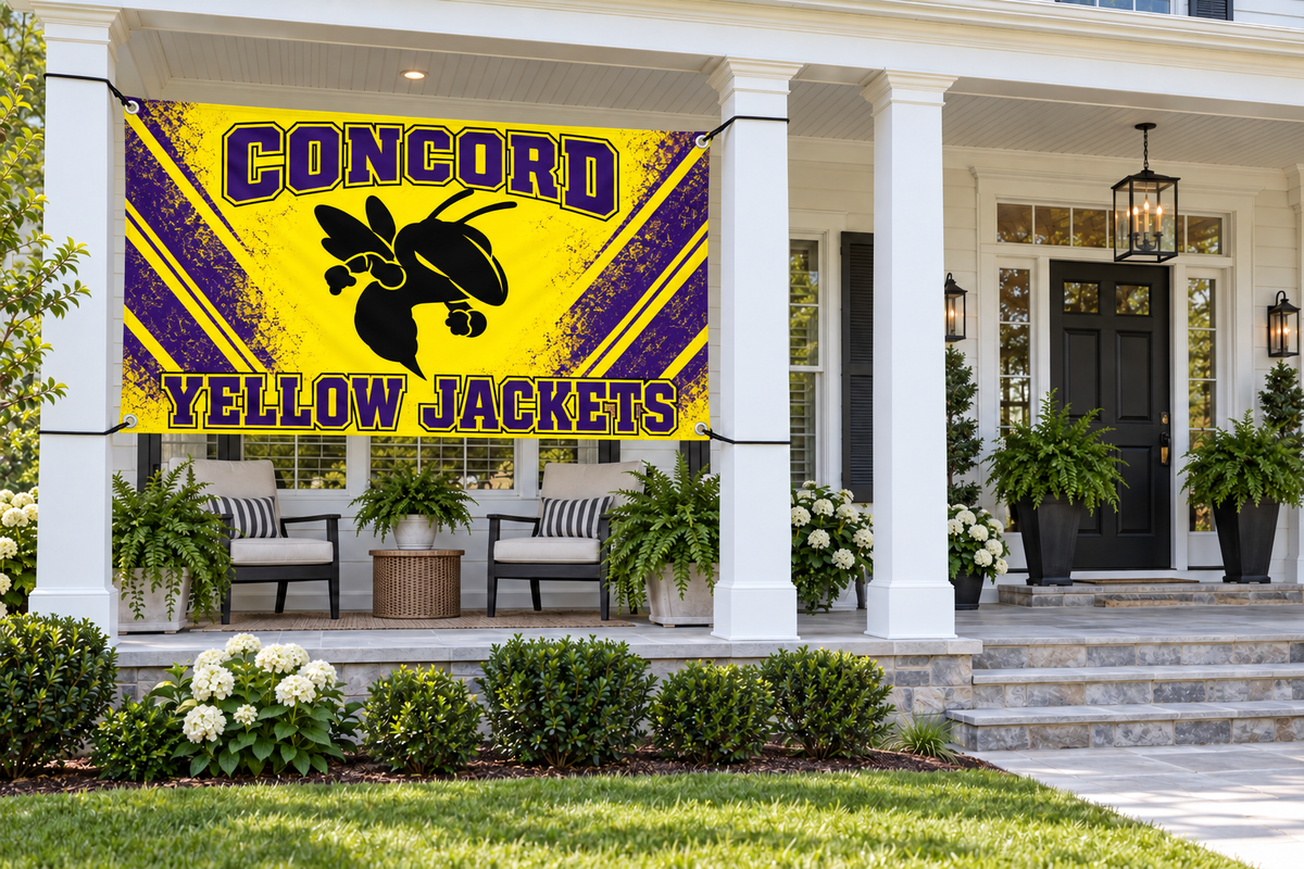 Concord Yellow Jackets Blackout Stripes Flags & Banners – 4 by 8 foot banner tied through four corner grommets beside a clear front entrance