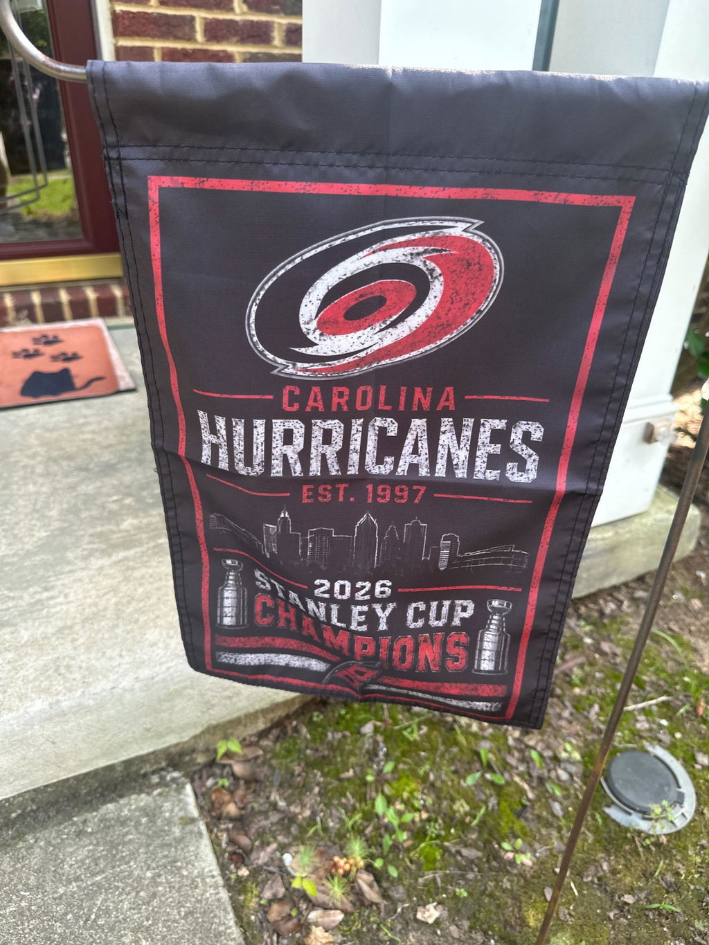 Customer photo of the Carolina Hurricanes 2026 Stanley Cup Champions garden flag