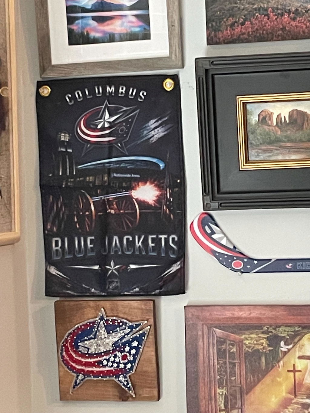 Customer photo of a custom Columbus hockey flag displayed on a wall