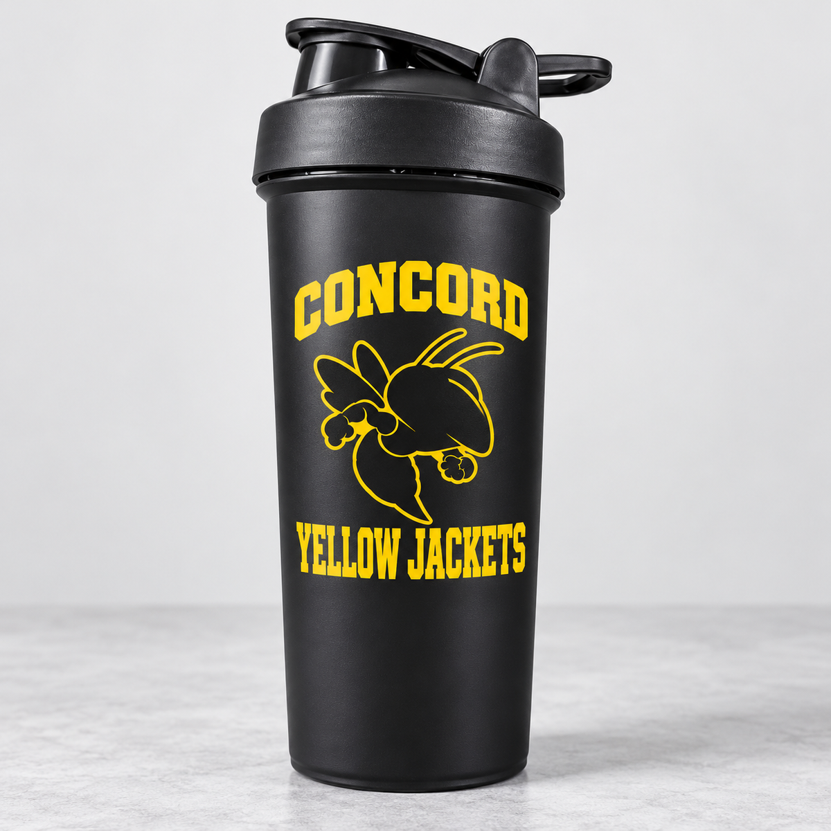 Black Concord Yellow Jackets shaker cup with yellow logo; one cup shown from the bulk pack of 120