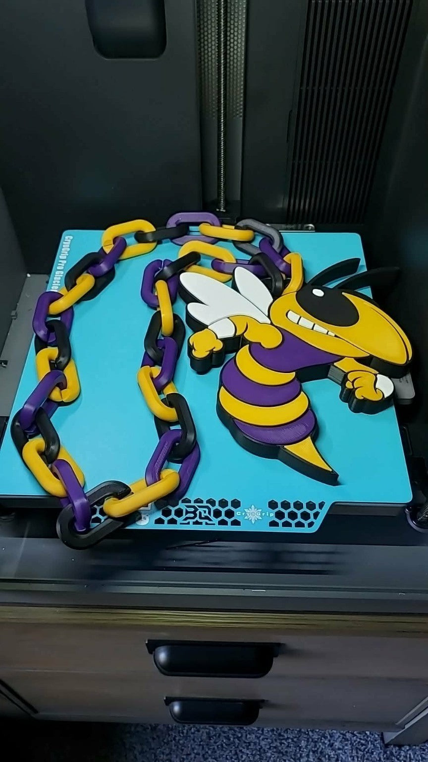 Concord Yellow Jackets 3D-printed mascot hype chain in purple, yellow, black and white with matching oversized links