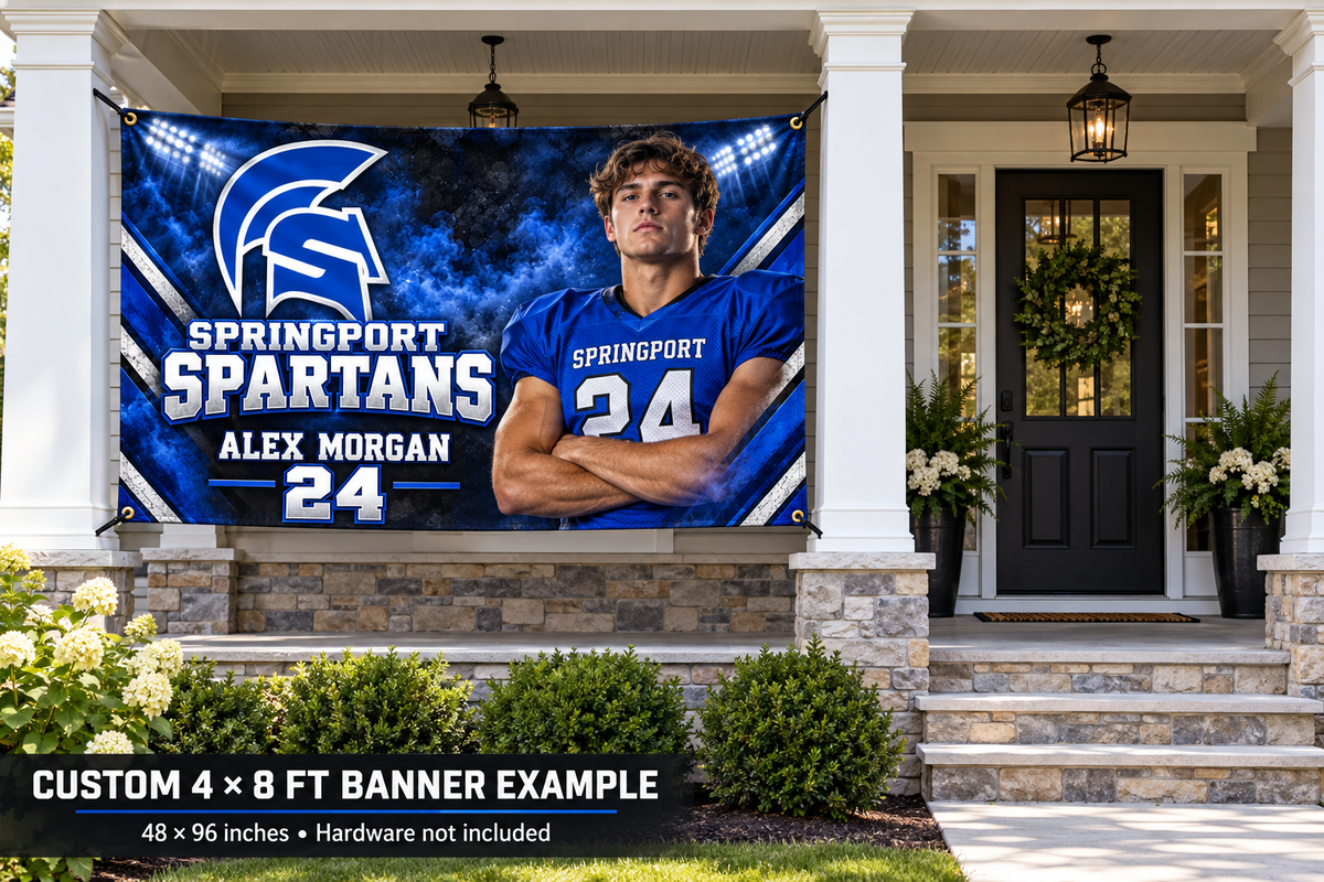 Springport Spartans custom 4 by 8 foot banner example with photo, name and jersey number; four corner grommets secured between porch pillars beside an unobstructed entrance.