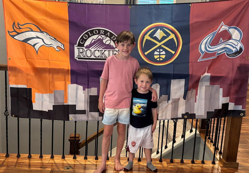 Customer photo of the Denver four-team skyline banner displayed indoors