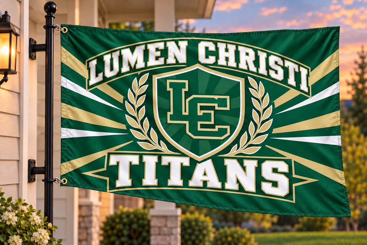 Lumen Christi Titans flag with both left grommets clipped directly to the house-mounted pole