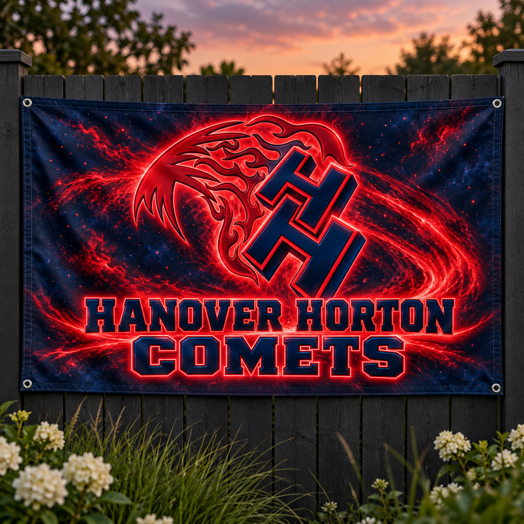Hanover Horton Comets Red Glow Comet printed flag in red and dark navy displayed on a garden fence