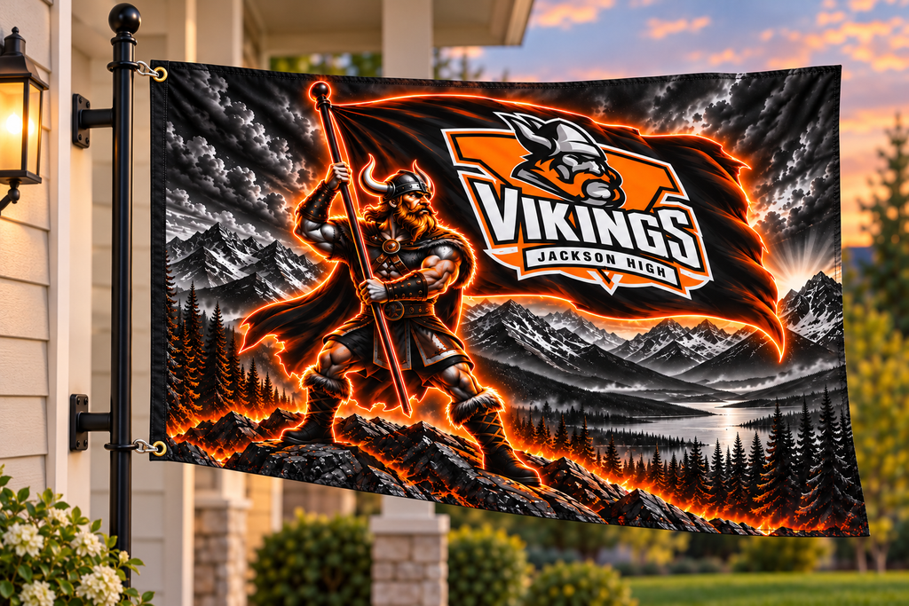 Jackson Vikings flag clipped to a house-mounted pole through both left grommets