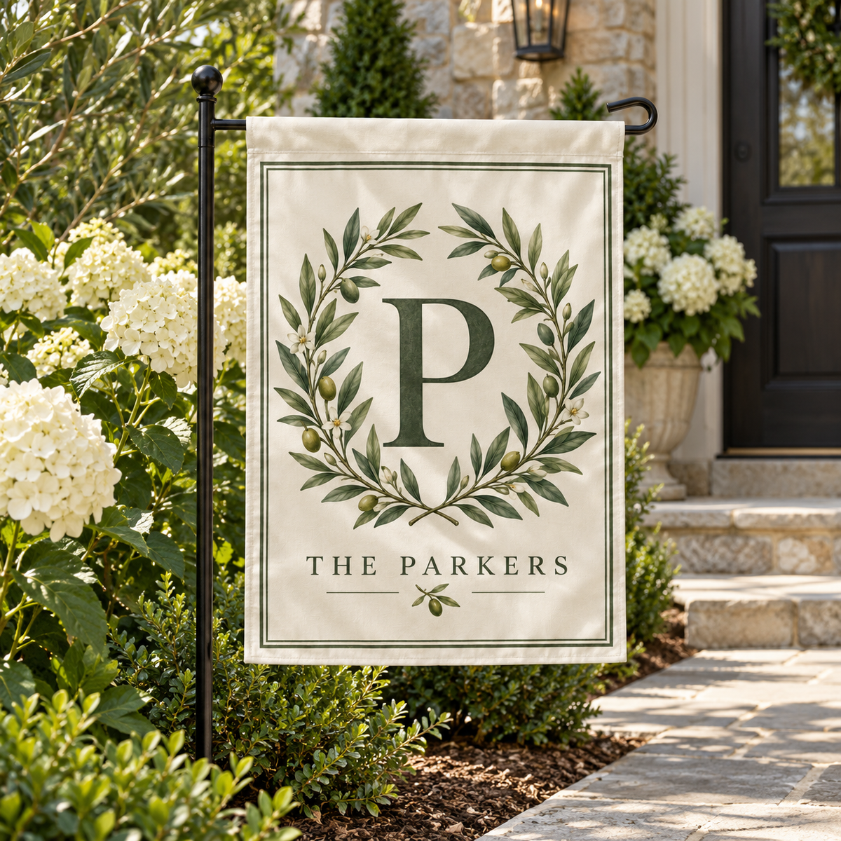Personalized Monogram Garden Flag | 18 × 12 in shown on a garden flag stand — realistic product mockup