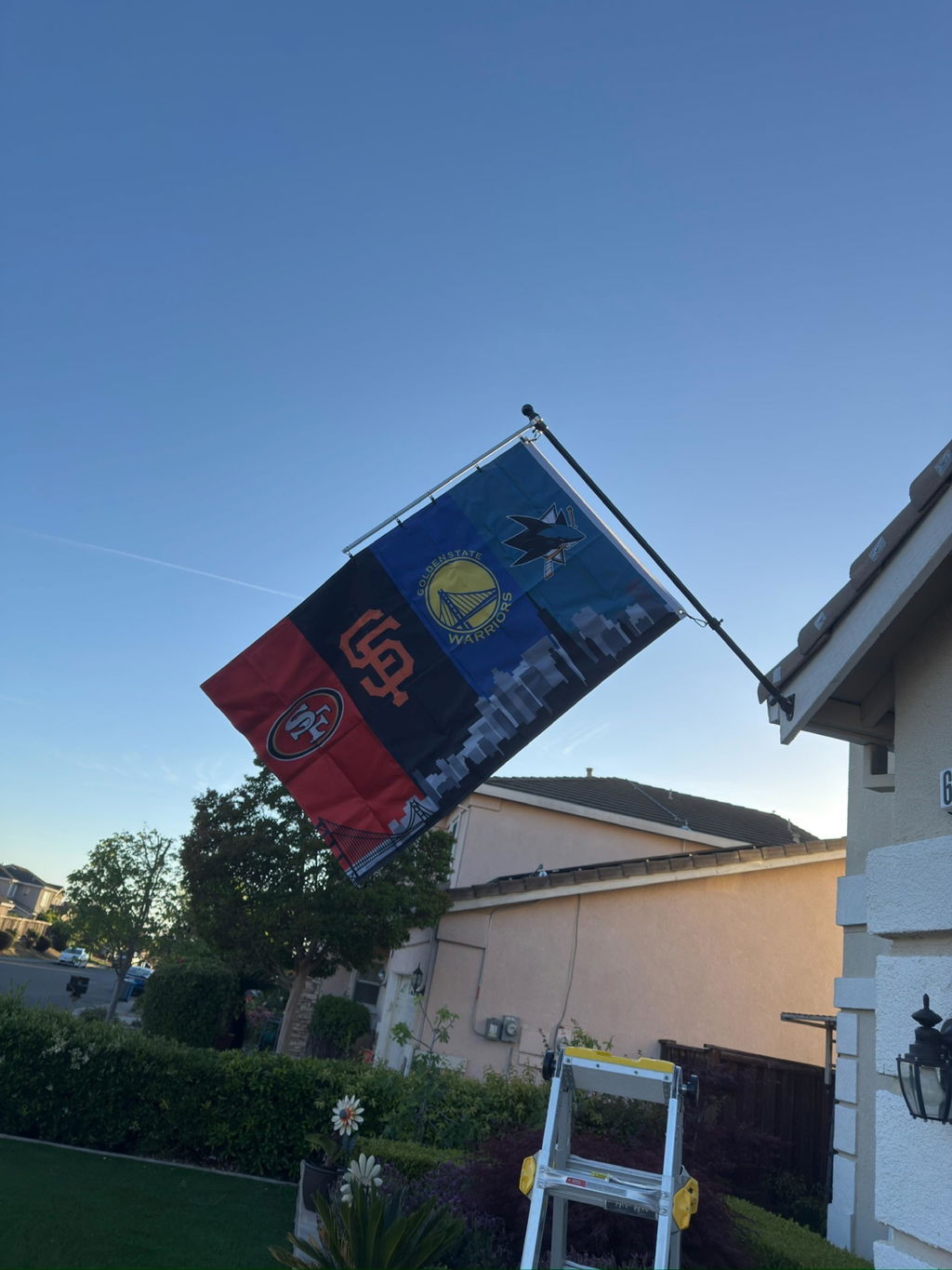 Customer photo of the San Francisco Bay Area four-team skyline flag flying outside
